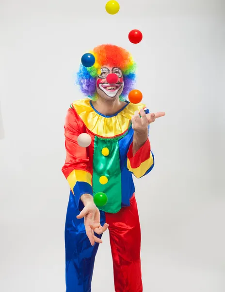 Clown juggling balls — Stock Photo, Image