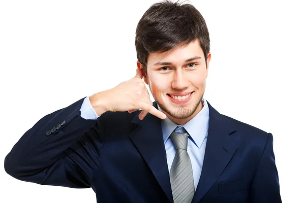 Businessman miming a phone with his hand — Stock Photo, Image