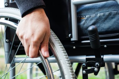 Man using his wheelchair clipart