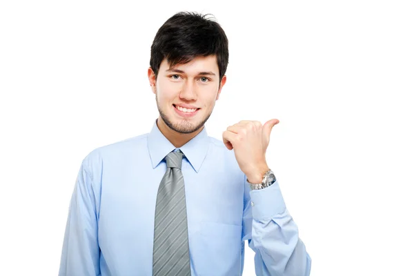 Young businessman pointing to the right — Stock Photo, Image