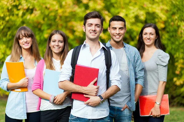 Happy students outdoor Royalty Free Stock Photos