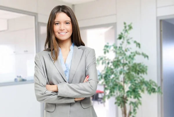 Young businesswoman in her office Stock Image