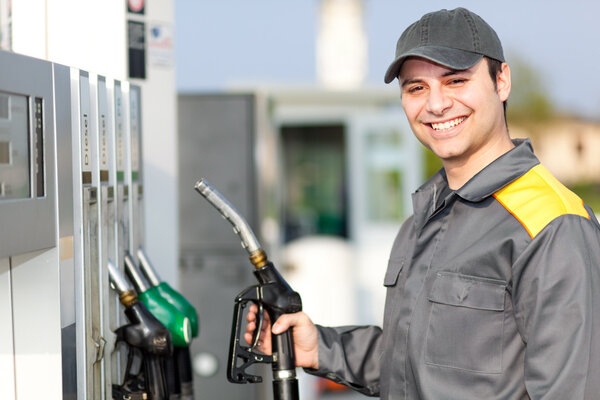 Gas station attendant at work