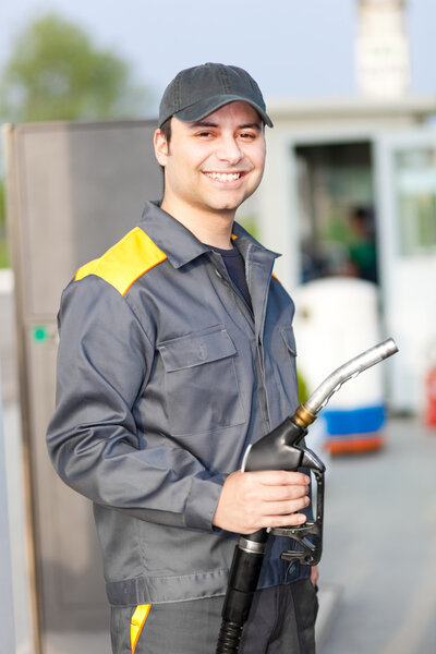 Gas station attendant at work