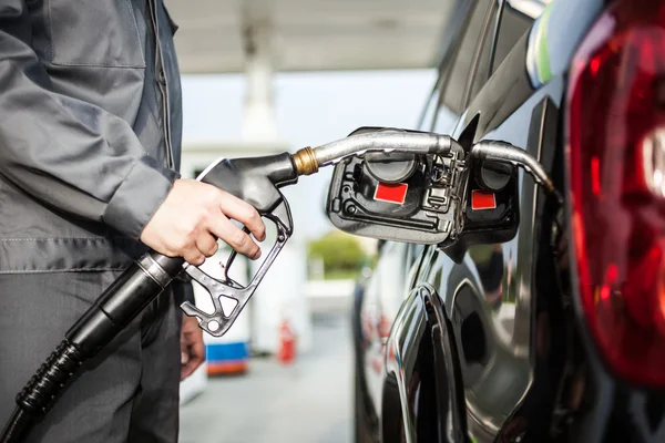 Gas station attendant at work — Stock Photo, Image