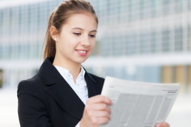 bir gazetede iş kadını