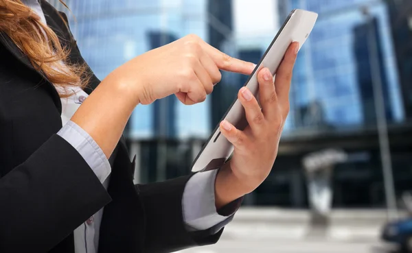 Businesswoman using a tablet — Stock Photo, Image