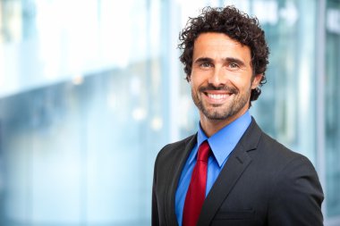 Handsome confident businessman