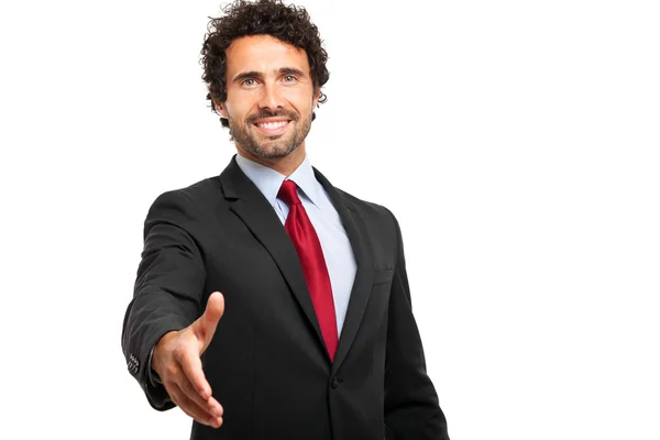 Businessman offering a handshake — Stok fotoğraf