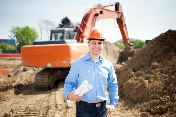 Architect in a construction site — Stock Photo, Image