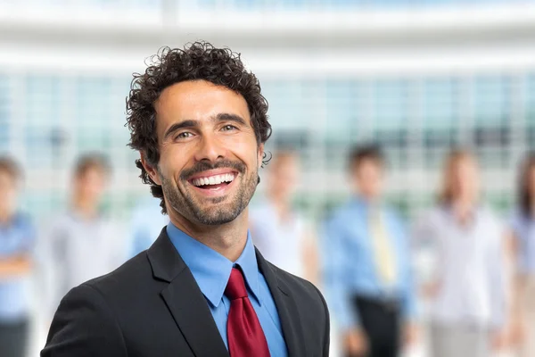 Leader and group of business people — Stock Photo, Image