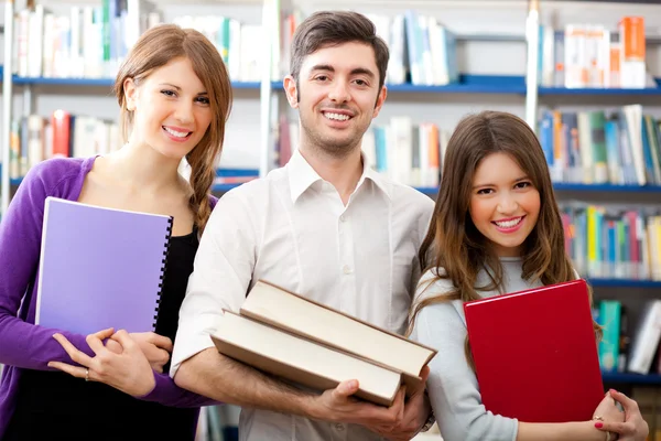 Group of students in a library Stock Photo