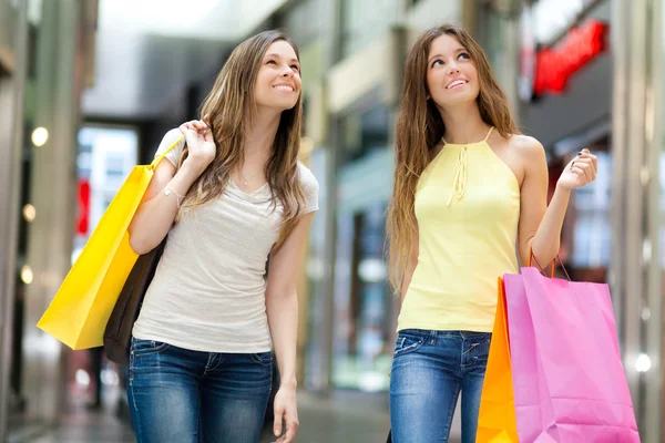 Friends shopping together Stock Photo