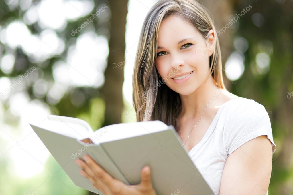 Woman studying at the park