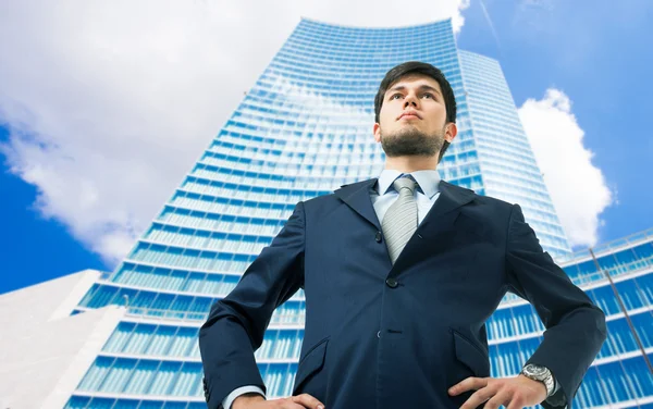 Young handsome businessman in city — Stock Photo, Image