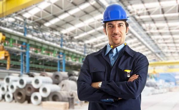 Portrait of a worker in factory — Stock Photo, Image