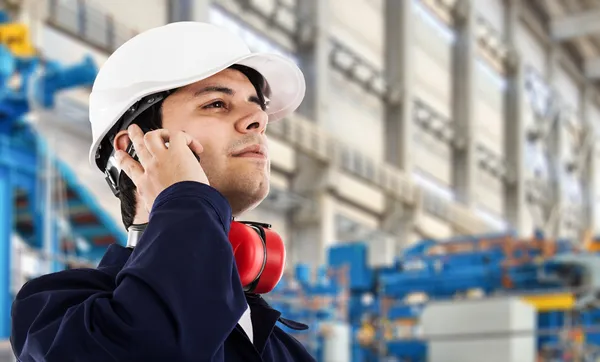 Portrait of a worker in factory — Stock Photo, Image