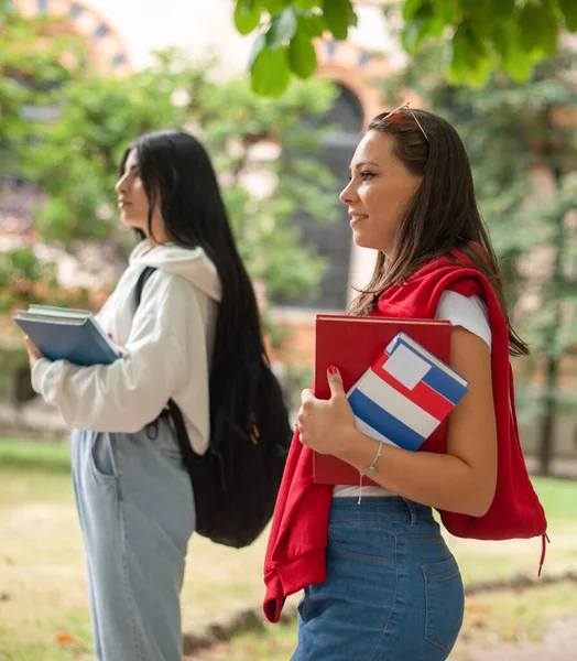 Female Student Holding Book While Walking Outdoor Park Smiling — Stock Photo, Image