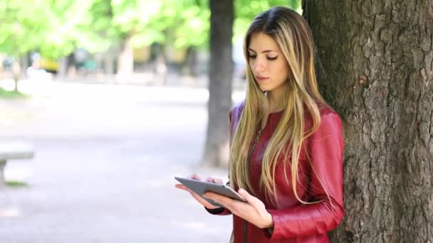 Young Woman Using Digital Tablet Lying Tree Park Enjoying Freedom — Stock Video