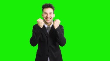 Başarılı iş adamı yeşil ekran krom anahtarında izole edildi