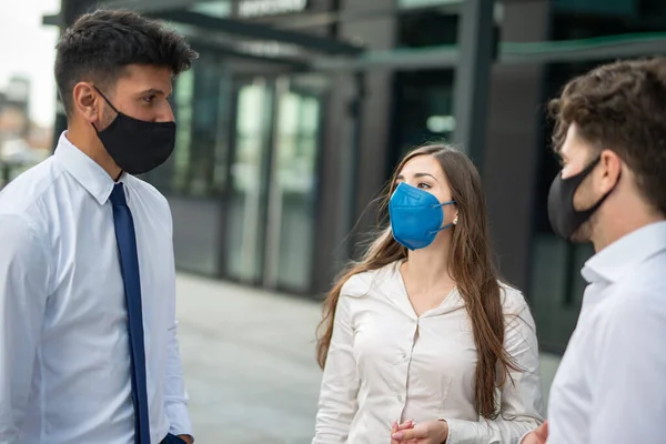 Group of masked business people during coronavirus pandemic