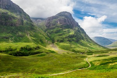 Green hills in the Scottish highlands clipart