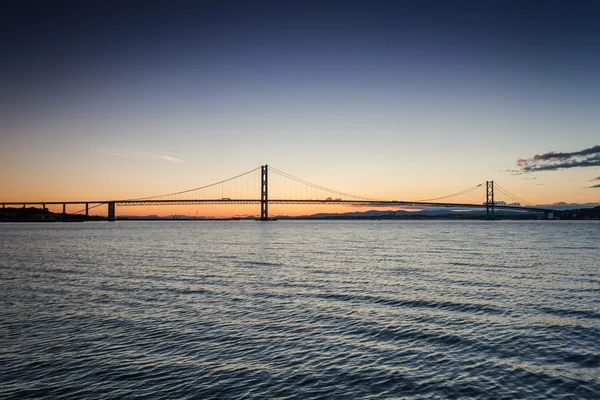 Sunset over river and bridges in Queensferry — Stock Photo, Image