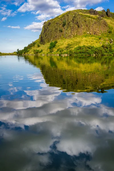 Reflection of clouds in a mountain lake in Scotland — Stock Photo, Image