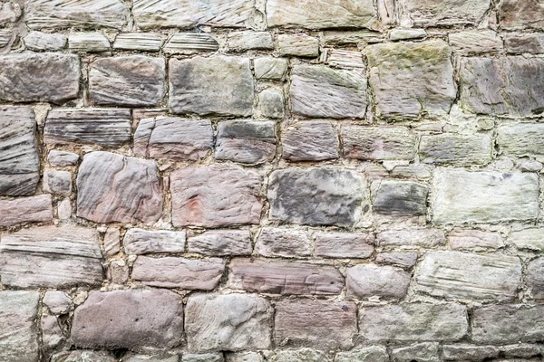 Середньовічна стіна зі старих каменів — стокове фото