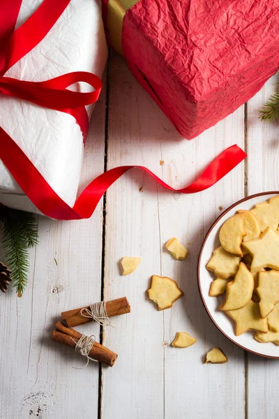 Cookies and gifts at Christmas time — Stock Photo, Image