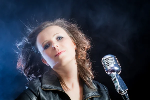 Close-up on the singer with microphone — Stock Photo, Image
