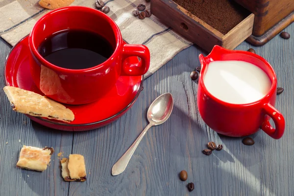 Coffee with milk served with cookie — Stock Photo, Image