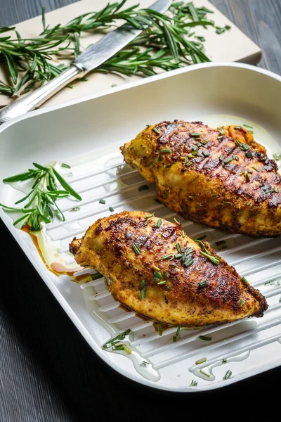 Grilled chicken breast in a pan — Stock Photo, Image