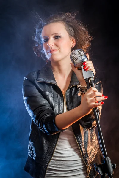 Beautiful young woman on the stage — Stock Photo, Image