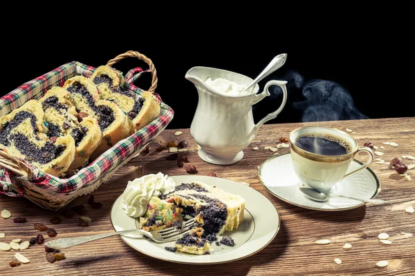 Hot coffee and poppy seed cake with nuts — Stock Photo, Image