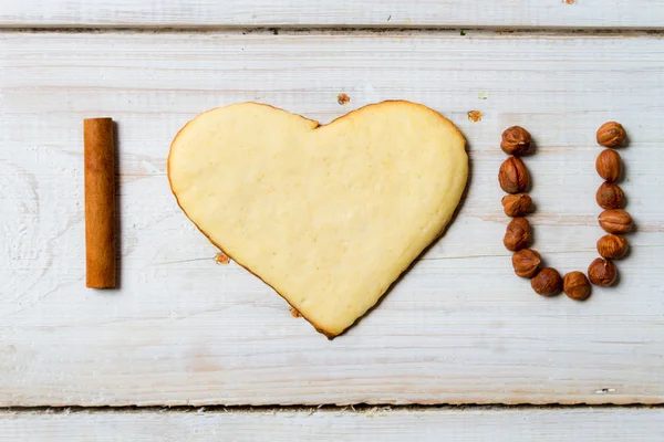 "Te amo "frase arreglada con galletas y nueces no. 2. —  Fotos de Stock