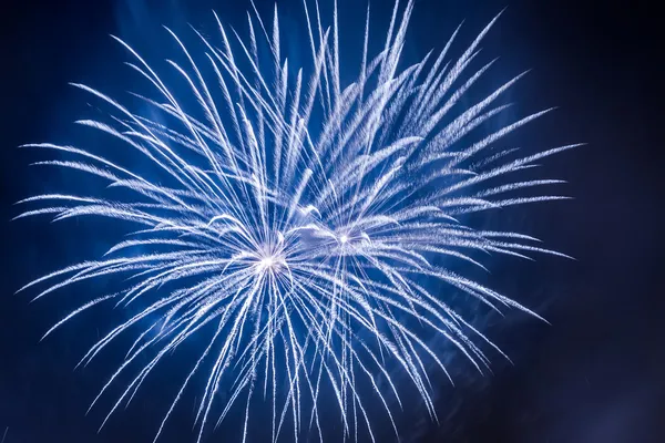 Blue fireworks during the celebrations event at night — Stock Photo, Image