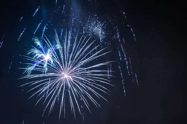 White fireworks during the celebrations at night — Stock Photo, Image