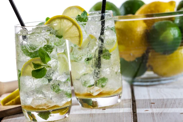 Lemon drink with ice in glass — Stock Photo, Image