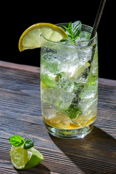 Closeup of cold glass ice lemon drink — Stock Photo, Image