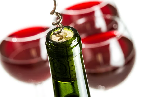 Closeup of opening green wine bottle — Stock Photo, Image