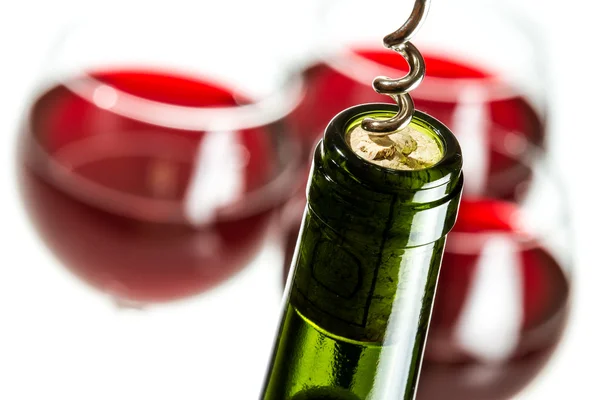 Opening green wine bottle — Stock Photo, Image