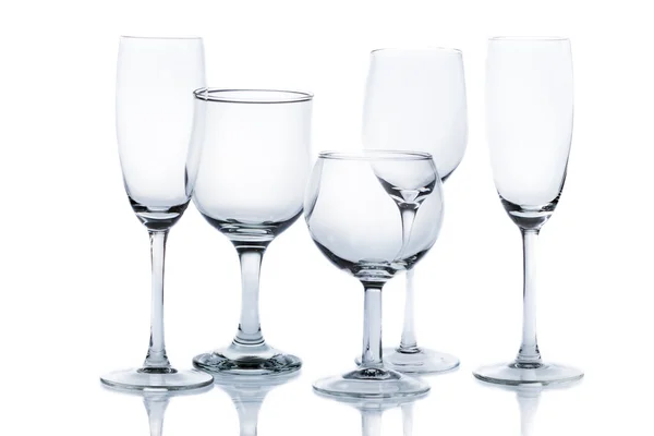 Különböző típusú üres pohár fehér alapon — Stock Fotó