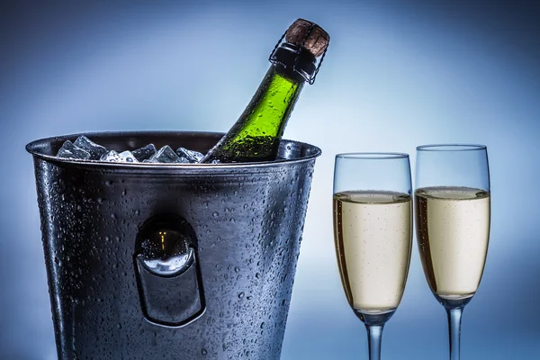 Cold chilled champagne in ice bucket — Stock Photo, Image