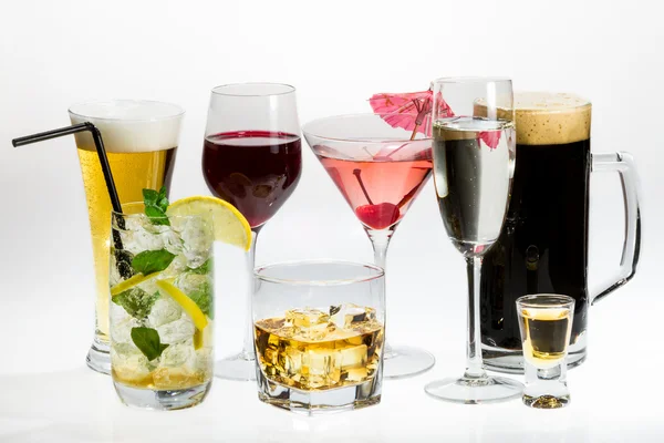 Various types of alcohol on a white background — Stock Photo, Image