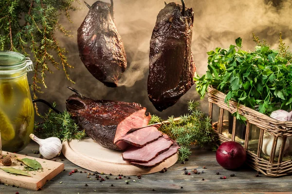 Rural smokehouse ham preparation for smoking — Stock Photo, Image