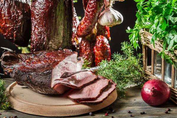 Freshly sliced ham on the table rural — Stock Photo, Image