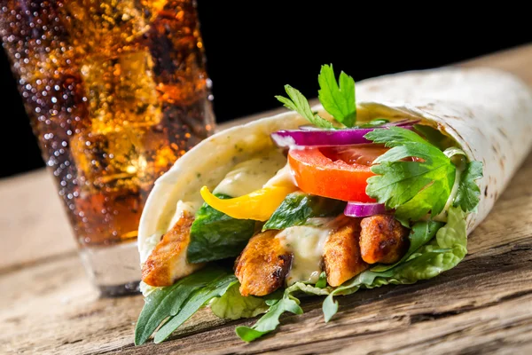 Closeup of kebab with fresh vegetables and chicken on black back — Stock Image Closeup of kebab with fresh vegetables and chicken on black back Royalty Free Stock Photos