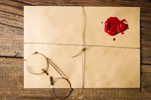 Ancient scrolls and old envelope with blue inkwell — Stock Photo, Image