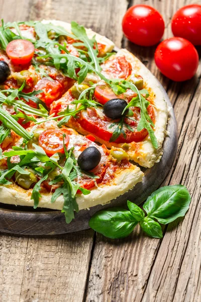 Freshly pizza served with red wine — Stock Photo, Image